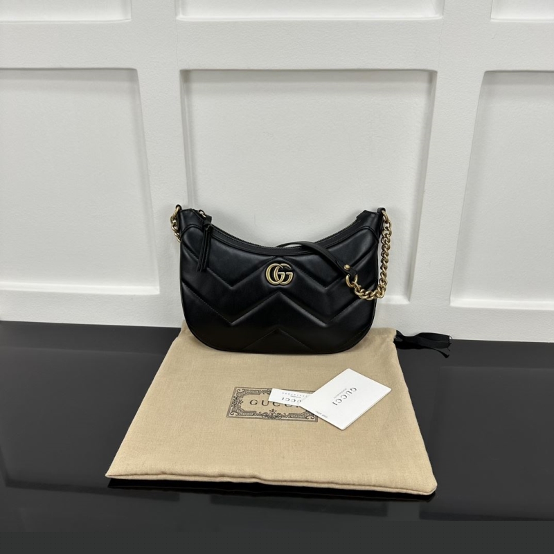 G*u*i top handle bags
